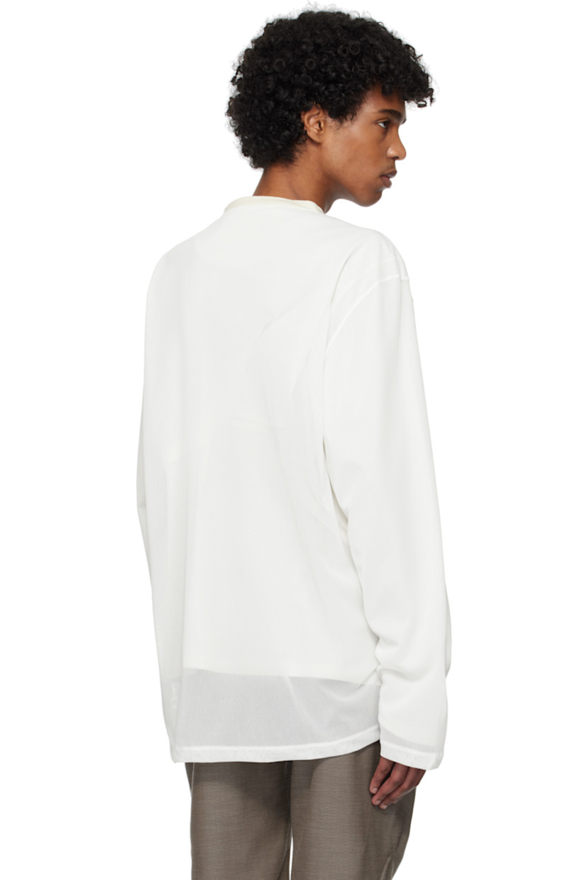 Cotton jersey and semi-sheer polyester mesh T-shirt.

· Layered construction
· Rib-knit trim at crewneck
· Pleated detailing at front
· Striped grosgrain trim at vented side seam

Supplier color: Off white/White
