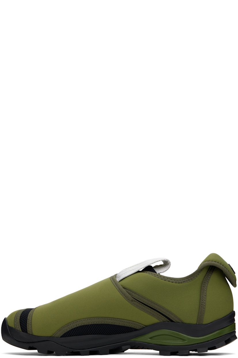 Low-top neoprene and mesh sneakers in green.

· Velcro flap with buffed leather trim at vamp
· Concealed drawstring fastening
· Pull-loop at padded collar
· Logo hardware at outer side and foldover heel tab
· Neoprene lining
· Treaded Vibram® rubber sole

Supplier color: Green tortoise