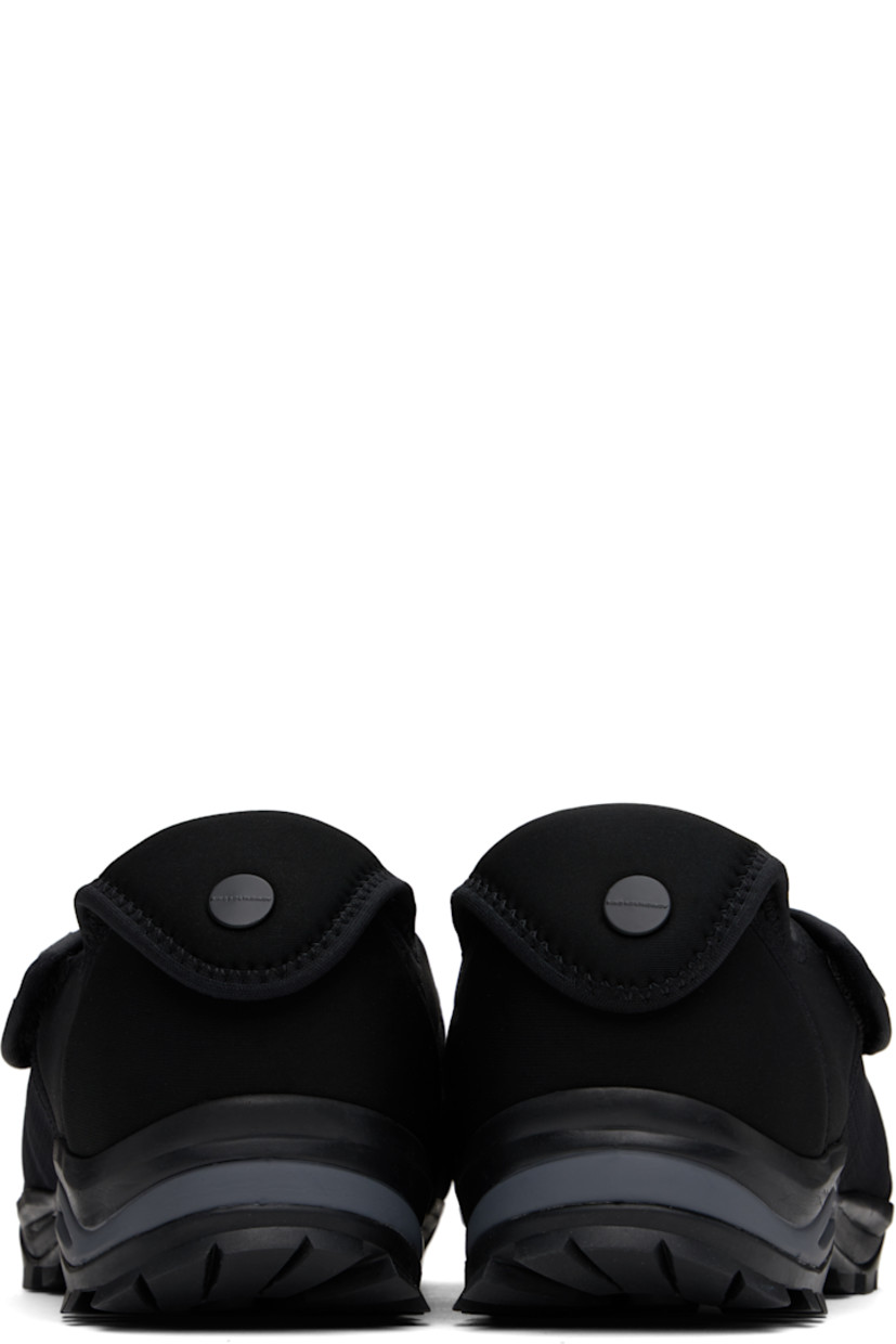 Low-top neoprene and mesh sneakers in black.

· Velcro strap at vamp
· Concealed bungee-style drawstring closure
· Woven pull-loop at padded tongue
· Logo hardware at outer side and heel collar
· Pull-tab at heel collar
· Neoprene and suede lining
· Treaded Vibram® rubber sole

Supplier color: Black matt