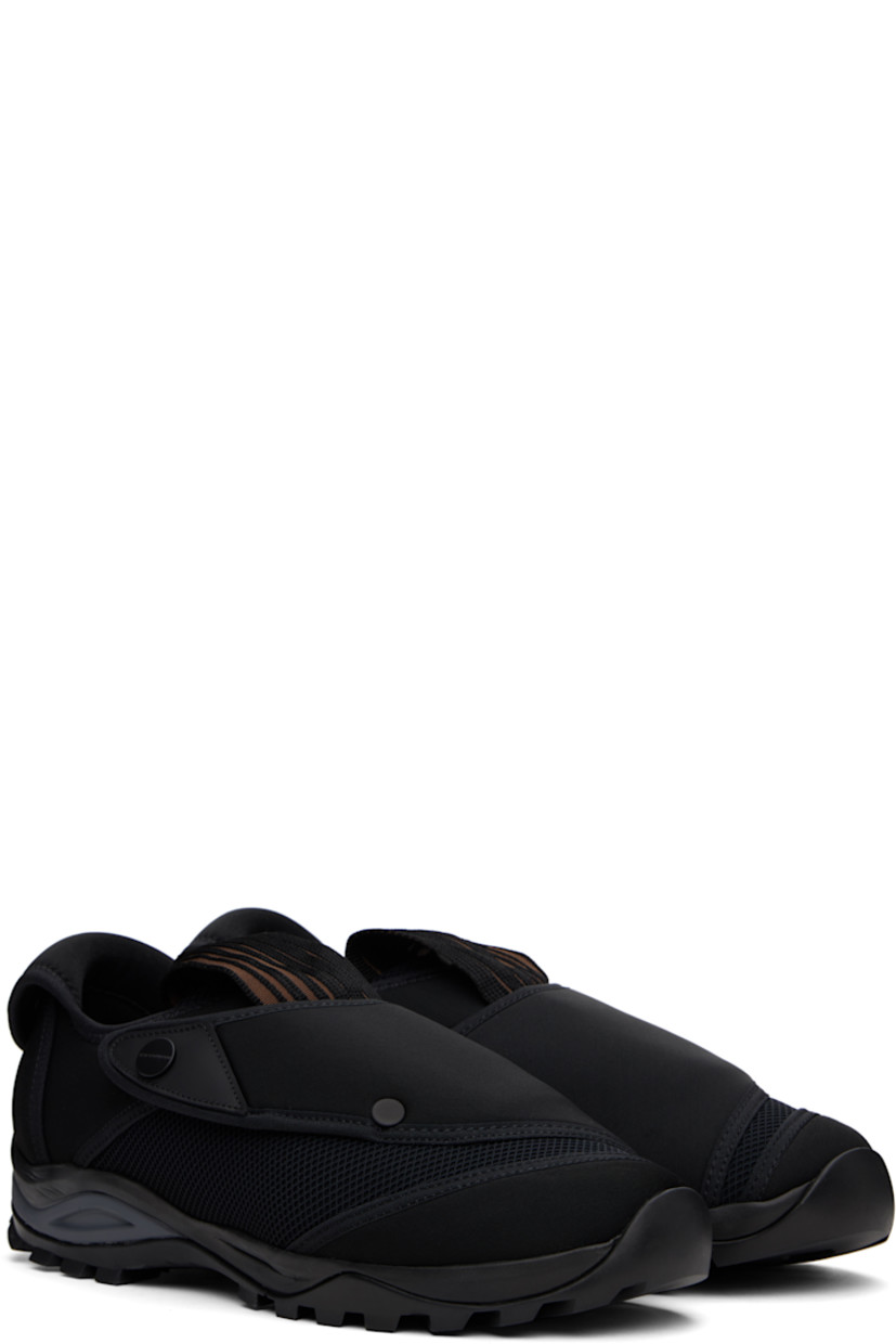 Low-top neoprene and mesh sneakers in black.

· Velcro strap at vamp
· Concealed bungee-style drawstring closure
· Woven pull-loop at padded tongue
· Logo hardware at outer side and heel collar
· Pull-tab at heel collar
· Neoprene and suede lining
· Treaded Vibram® rubber sole

Supplier color: Black matt