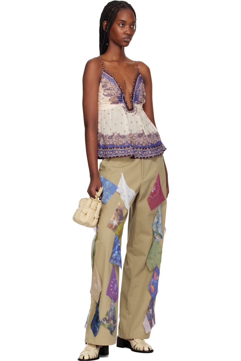 Handcrafted basket-woven raffia top handle bag in beige.

· Buffed calfskin trim throughout 
· Whipstitching at rolled carry handle
· Knotted shoulder strap
· Pleats at sides
· Magnetic closure 
· Organic cotton canvas lining 
· H5.5" x W12" x D5"

Supplier color: Natural