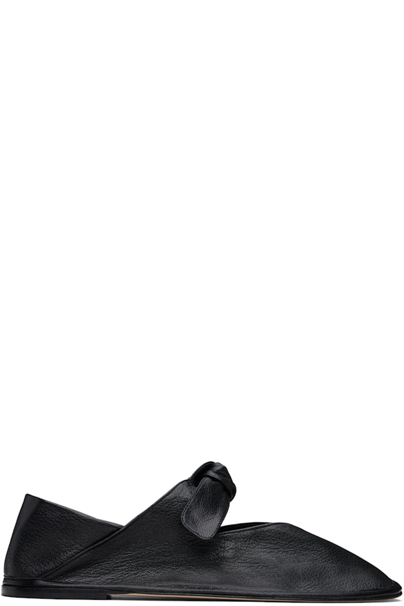 Handcrafted grained lambskin ballerina flats in black.

· Square toe
· Knotted detailing at partially elasticized strap
· Collapsible heel counter
· Calfskin sole with rubber injection

Supplier color: Black