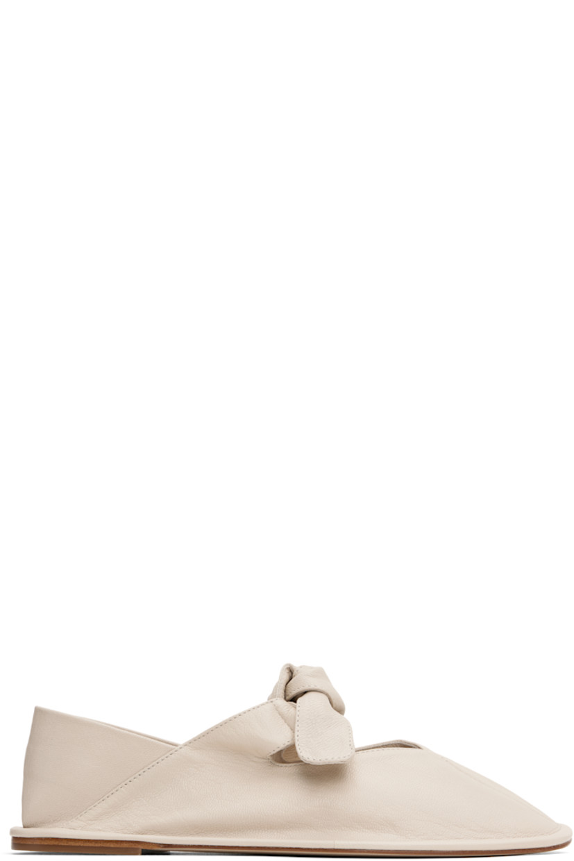 Handcrafted grained lambskin Mary Jane-style ballerina flats in off-white.

· Square toe
· Self-tie bow accent at vamp 
· Collapsible heel counter
· Calfskin sole with rubber injection

Supplier color: Cream