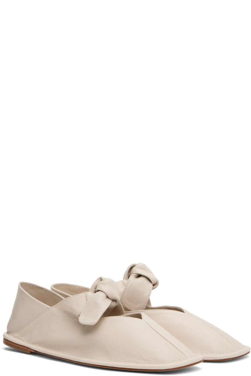 Handcrafted grained lambskin Mary Jane-style ballerina flats in off-white.

· Square toe
· Self-tie bow accent at vamp 
· Collapsible heel counter
· Calfskin sole with rubber injection

Supplier color: Cream