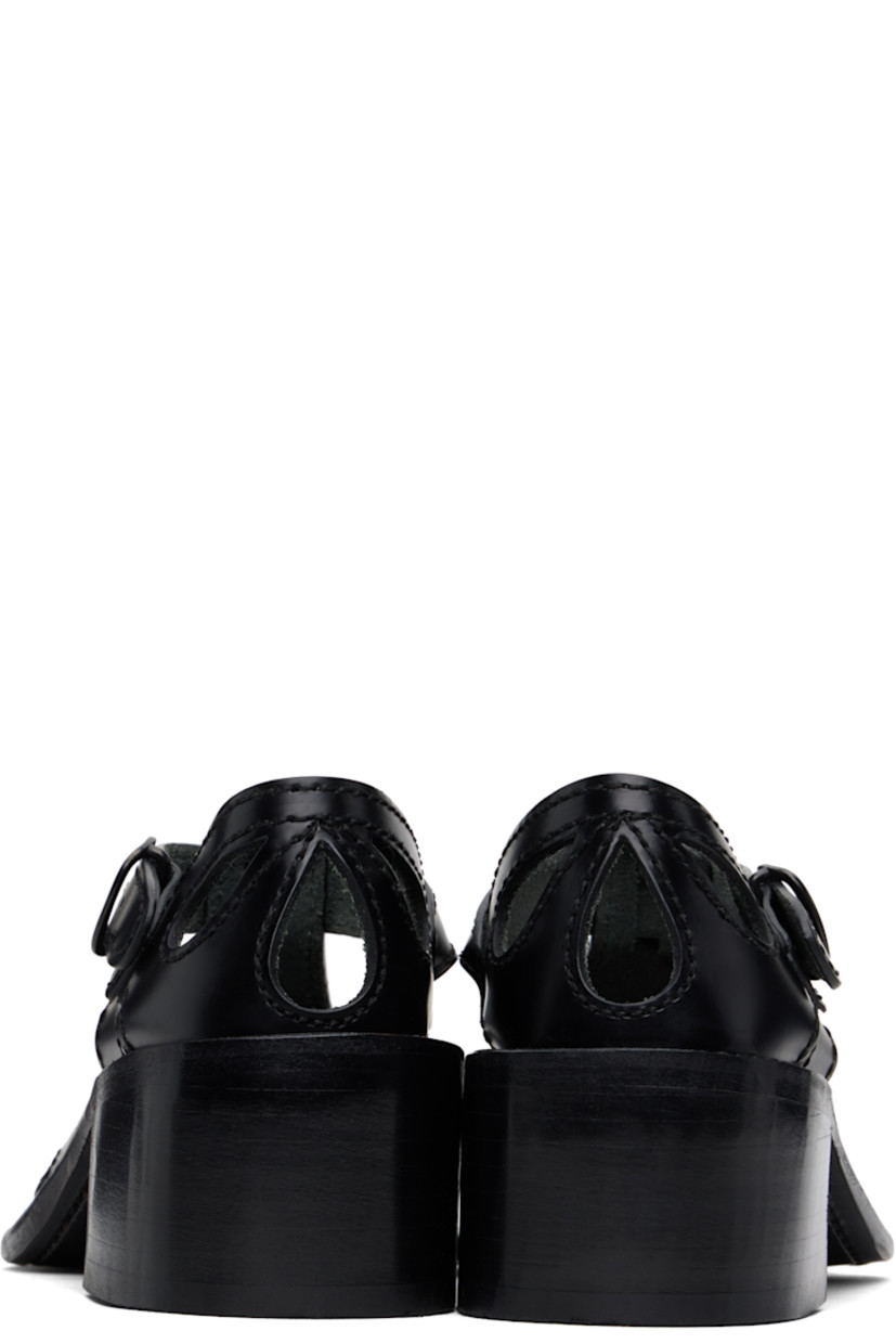 Handcrafted polished calfskin heels in black.

· Cutouts and embroidered detailing throughout
· Pin-buckle ankle strap
· Logo embossed at calfskin footbed
· Stacked calfskin block heel and midsole
· Calfskin sole with rubber injection
· Heel: H2"

Supplier color: Black