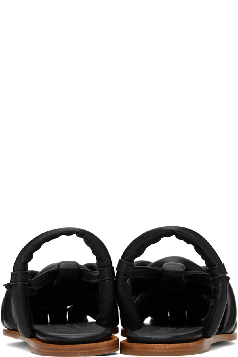 Handcrafted grained lambskin flat sandals in black.

· Square toe
· Woven straps at vamp
· Pin-buckle ankle strap
· Fixed slingback strap
· Logo embossed at padded lambskin footbed
· Nubuck sole with rubber injection

Supplier color: Black