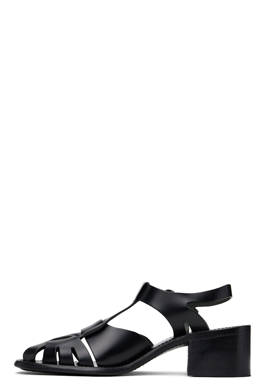 Handcrafted polished calfskin heels in black.

· Cutouts throughout
· Pin-buckle ankle strap
· Logo embossed at calfskin footbed
· Suede lining
· Serrated detailing at welt
· Stacked calfskin heel and midsole
· Calfskin sole with rubber injection
· Heel: H2"

Supplier color: Black