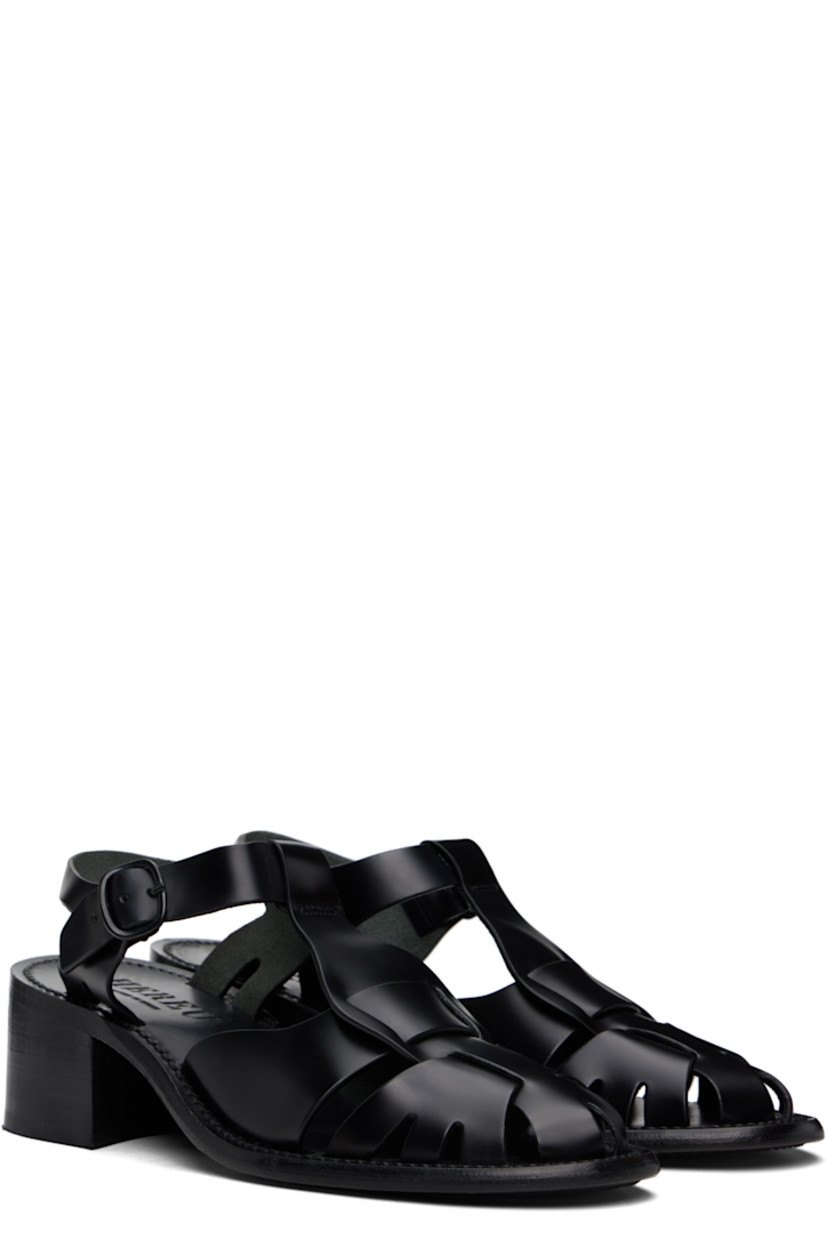 Handcrafted polished calfskin heels in black.

· Cutouts throughout
· Pin-buckle ankle strap
· Logo embossed at calfskin footbed
· Suede lining
· Serrated detailing at welt
· Stacked calfskin heel and midsole
· Calfskin sole with rubber injection
· Heel: H2"

Supplier color: Black