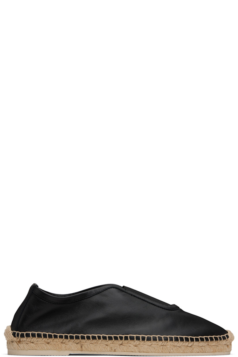 Handcrafted grained calfskin espadrilles in black.

· Embroidered detailing at toe
· Elasticized gusset at vamp
· Blanket stitching at welt
· Braided jute midsole
· Treaded rubber sole

Supplier color: Black