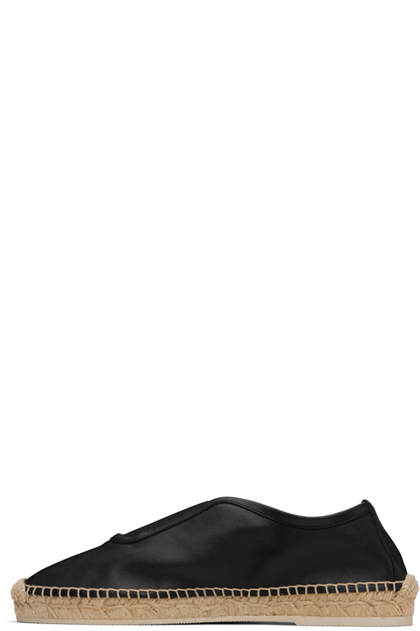 Handcrafted grained calfskin espadrilles in black.

· Embroidered detailing at toe
· Elasticized gusset at vamp
· Blanket stitching at welt
· Braided jute midsole
· Treaded rubber sole

Supplier color: Black