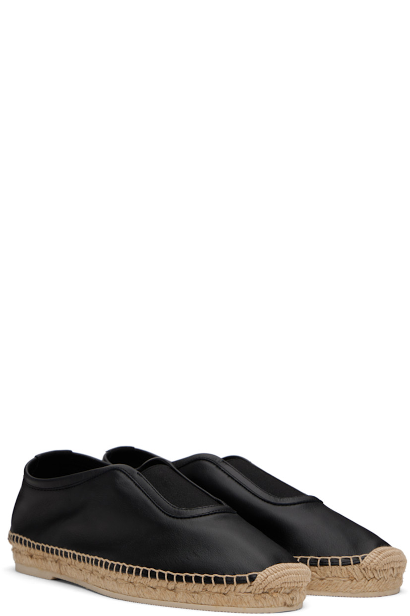 Handcrafted grained calfskin espadrilles in black.

· Embroidered detailing at toe
· Elasticized gusset at vamp
· Blanket stitching at welt
· Braided jute midsole
· Treaded rubber sole

Supplier color: Black