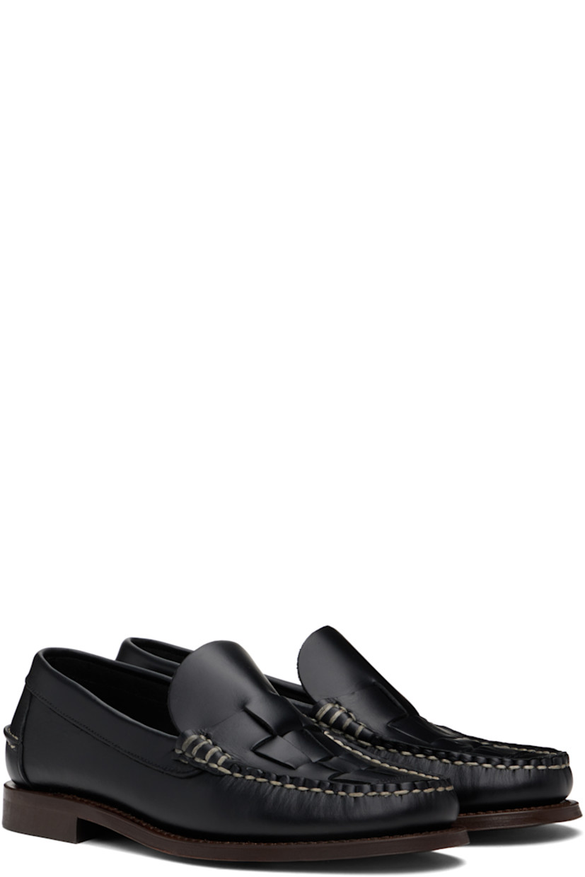 Handcrafted vegetable-tanned calfskin loafers in black.

· Moc toe
· Woven detailing at vamp
· Pinched seam at heel counter
· Logo-embossed padded leather footbed
· Suede lining
· Stacked leather heel with rubber injection
· Calfskin sole
· Contrast stitching in white

Supplier color: Black