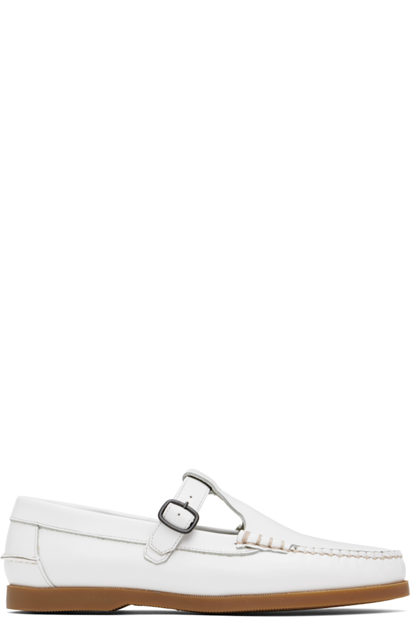 Handcrafted polished calfskin boat shoes in white.

· Moc toe
· Pin-buckle strap at vamp
· Pinched seam at heel counter
· Logo-embossed padded leather footbed
· Suede lining
· Treaded rubber sole 
· Contrast stitching in beige

Supplier color: White