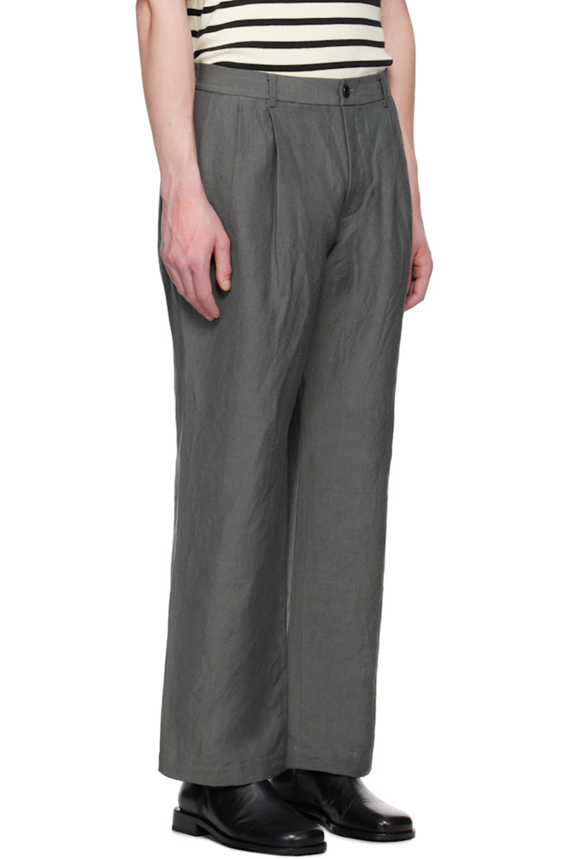 Wool- and linen-blend hopsack trousers.

· Wide straight-leg
· Belt loops
· Concealed drawstring at partially elasticized waistband
· Four-pocket styling
· Zip fly
· Pleats at front
· Logo patch at back pocket

Supplier color: Gray