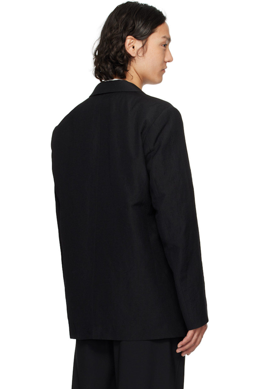 Wool- and linen-blend canvas blazer.

· Notched lapel
· Open front
· Welt pockets
· Padded shoulders
· Logo patch at cuff
· Welt pockets at interior
· Partial satin lining

Part of the N.HOOLYWOOD COMPILE collection.

Supplier color: Black