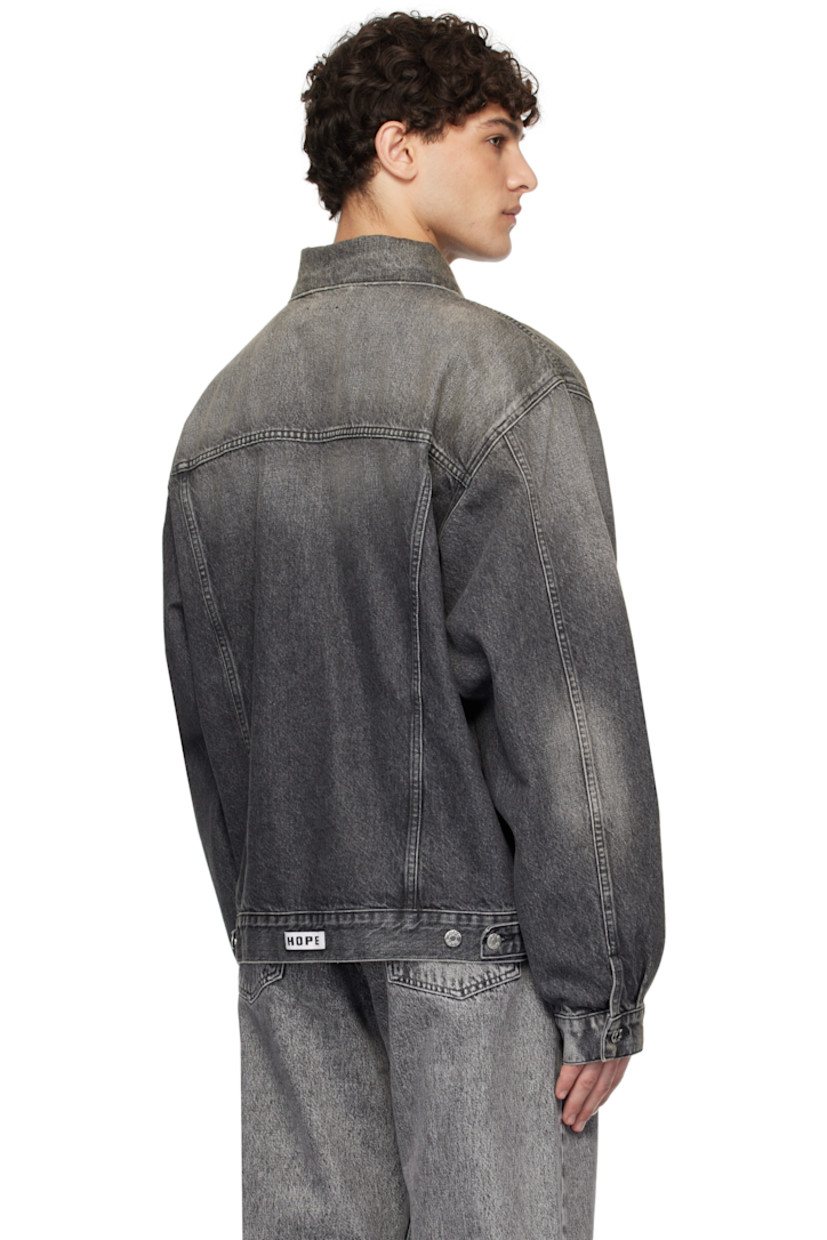 Oversized non-stretch organic cotton denim jacket. Fading throughout. 

· Boxy-fit
· Spread collar
· Button closure
· Flap and welt pockets
· Single-button barrel cuffs
· Logo patch at back hem
· Adjustable button tabs at back hem
· Patch pockets at interior 
· Logo-engraved silver-tone hardware

Supplier color: Heavy black vintage