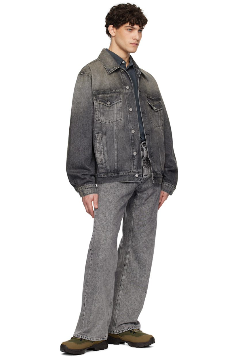 Oversized non-stretch organic cotton denim jacket. Fading throughout. 

· Boxy-fit
· Spread collar
· Button closure
· Flap and welt pockets
· Single-button barrel cuffs
· Logo patch at back hem
· Adjustable button tabs at back hem
· Patch pockets at interior 
· Logo-engraved silver-tone hardware

Supplier color: Heavy black vintage