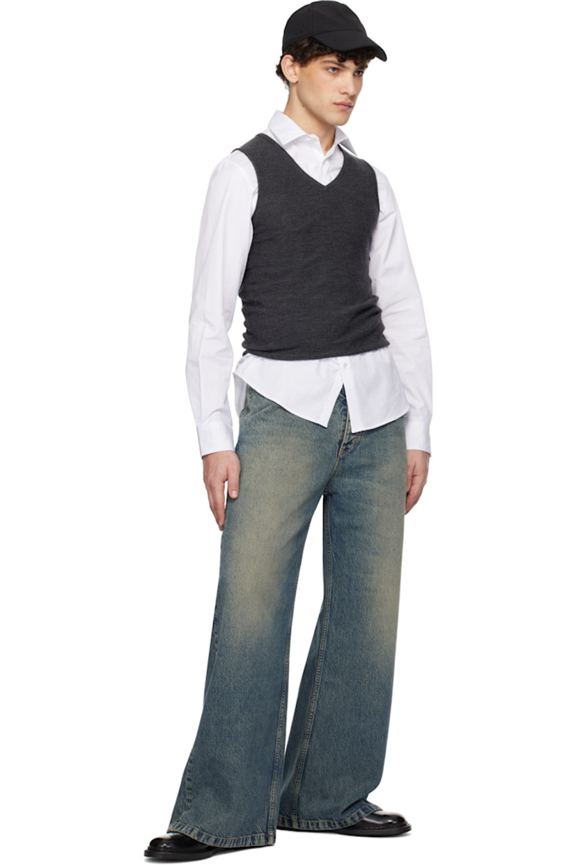 Flared non-stretch regenerative- and organic cotton-blend denim jeans. Fading and whiskering throughout. 

· Wide-leg
· Belt loops 
· Five-pocket styling 
· Button-fly 
· Logo patch at back waistband 
· Logo-engraved silver-tone hardware 
· Contrast stitching in tan 

Supplier color: Mid blue dirty