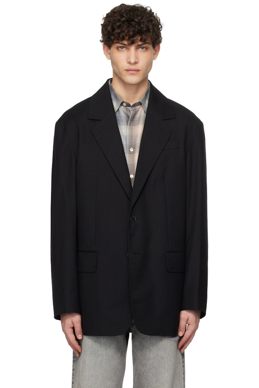 Oversized recycled cotton- and wool-blend twill blazer.

· Notched lapel
· Button closure
· Welt pocket and flap pockets
· Darts at front
· Three-button surgeon's cuffs
· Central vent at back hem
· Welt pockets at interior
· Partial satin lining
· Corozo hardware 

Supplier color: Soft black