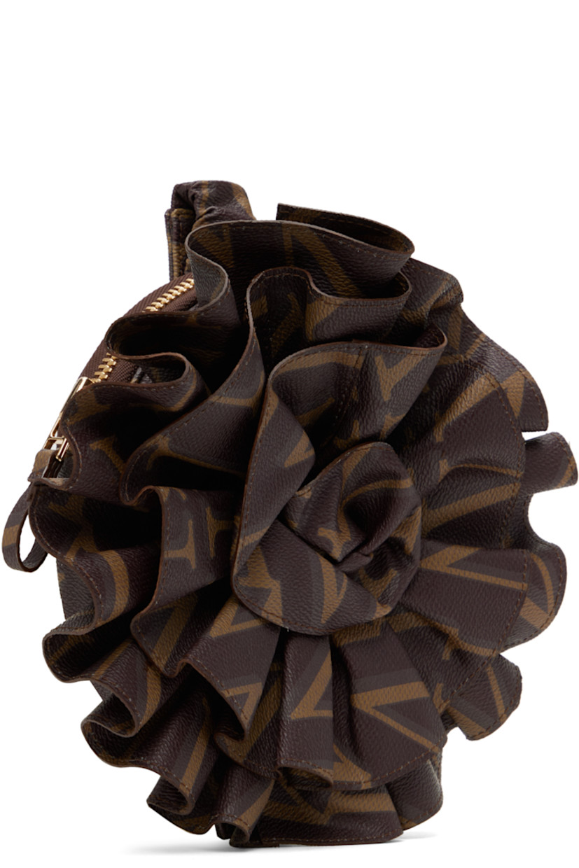 Grained faux-leather pouch in brown.

· Logo pattern printed throughout
· Adjustable and partially elasticized wristlet
· Floral appliqué at face
· Zip closure
· Cotton twill lining
· Gold-tone hardware
· H8" x W8" x D2"

Supplier color: Brown