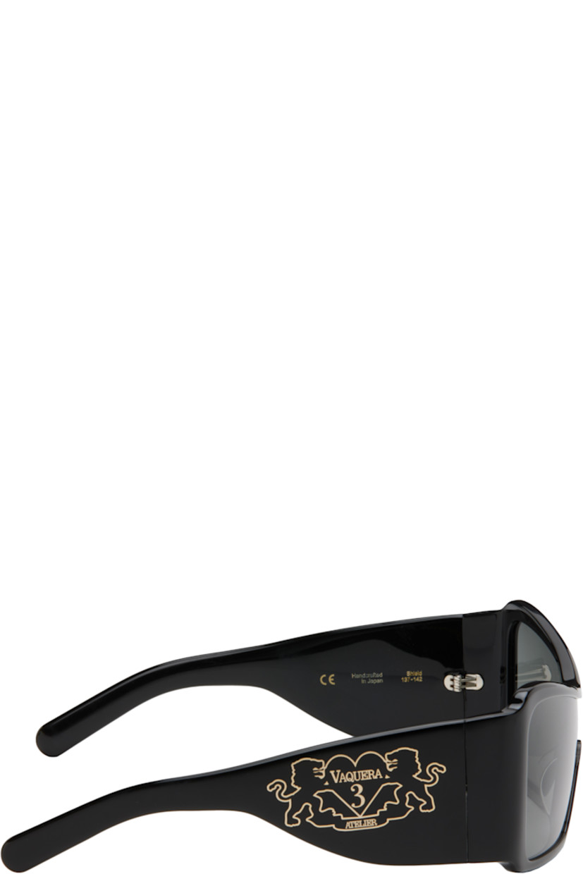 Shield-style acetate-frame sunglasses in black.

· Handcrafted
· Gray lens
· Integrated nose pads
· Inset logo hardware at temples
· Gold-tone hardware
· Includes case 
· Size: 137. 142 

Supplier color: Black