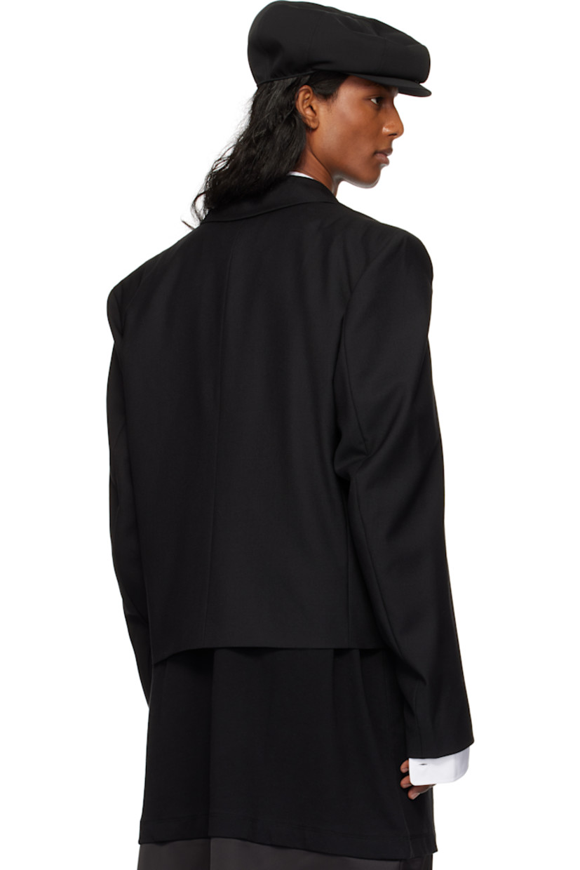 Wool cavalry twill blazer.

· Peaked lapel
· Double-breasted button closure
· Welt pocket and flap pockets
· Cropped hem
· Padded shoulders
· Satin lining

Supplier color: Black