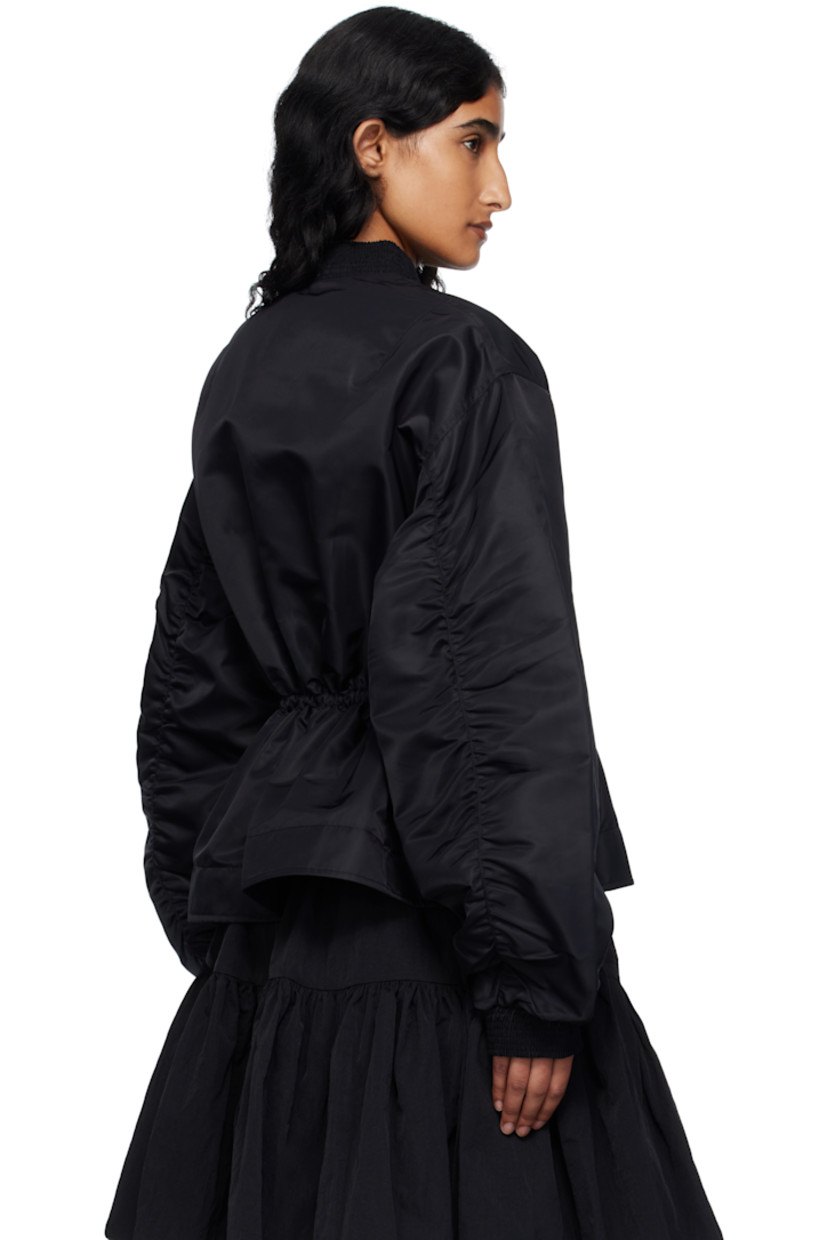 Insulated nylon taffeta bomber jacket.

· Shirring at stand collar and cuffs
· Two-way zip closure
· Flap pockets at front and sleeve
· Bungee-style drawstring at waist
· Flared hem
· Dropped shoulders
· Full satin lining

Supplier color: Black