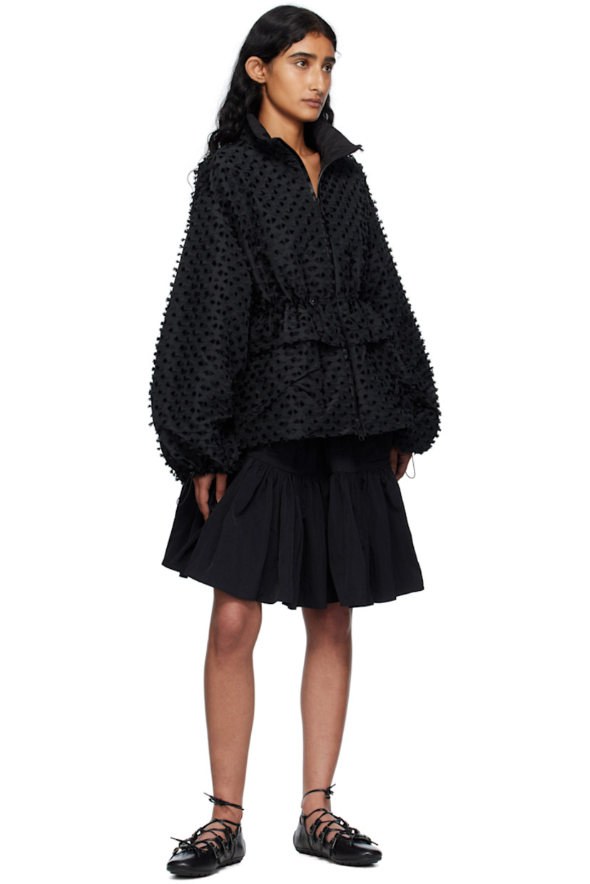 Crinkled recycled nylon taffeta miniskirt.

· Gathering throughout
· Bungee-style drawstring at elasticized waistband
· Two-pocket styling

Supplier color: Black