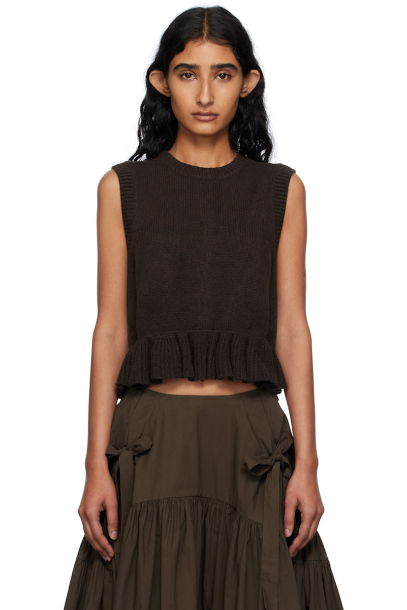 Knit recycled cashmere-blend vest.

· Rib-knit crewneck, hem, and armscyes
· Ruffled peplum hem
· Button closure at back

Supplier color: Brown