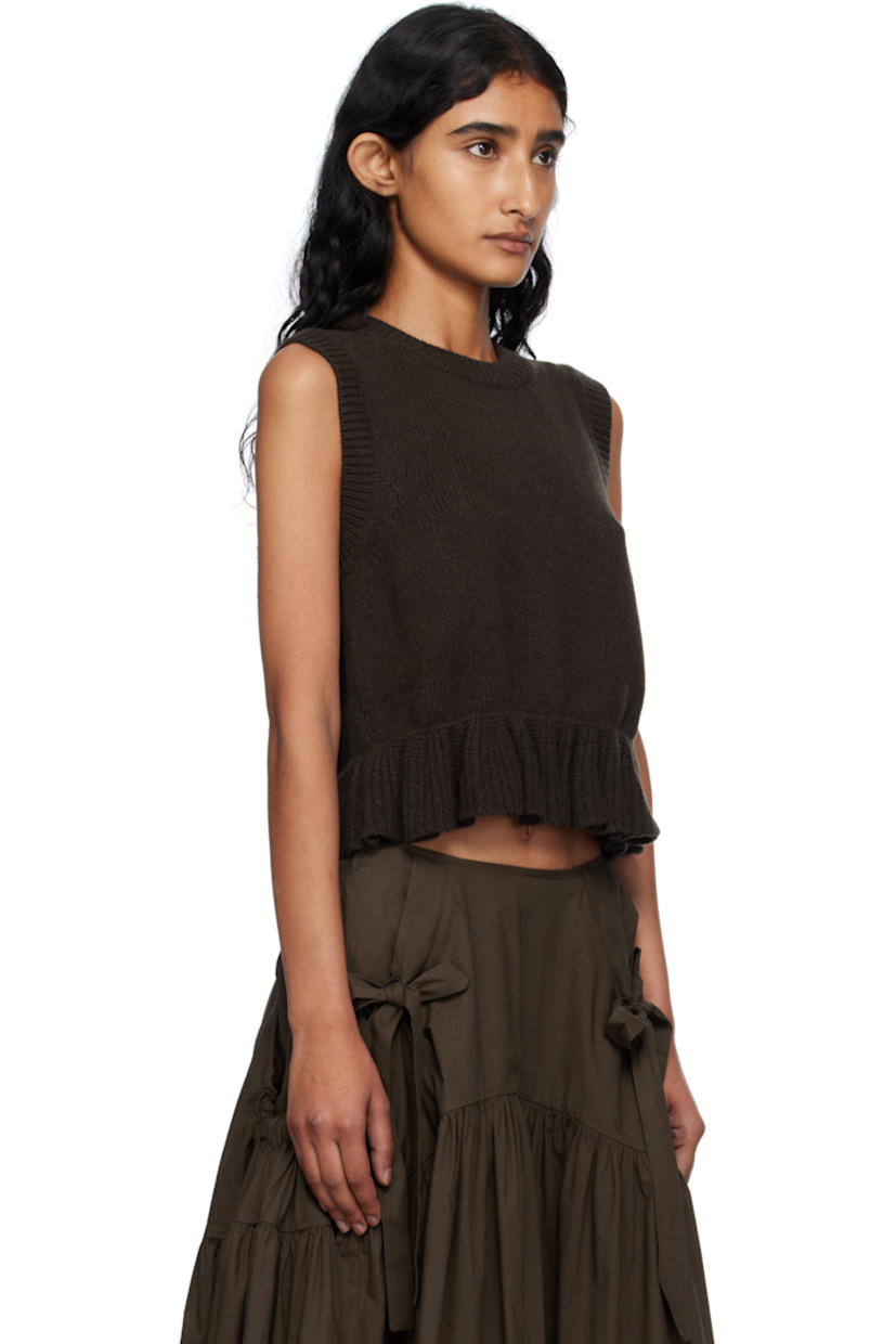 Knit recycled cashmere-blend vest.

· Rib-knit crewneck, hem, and armscyes
· Ruffled peplum hem
· Button closure at back

Supplier color: Brown