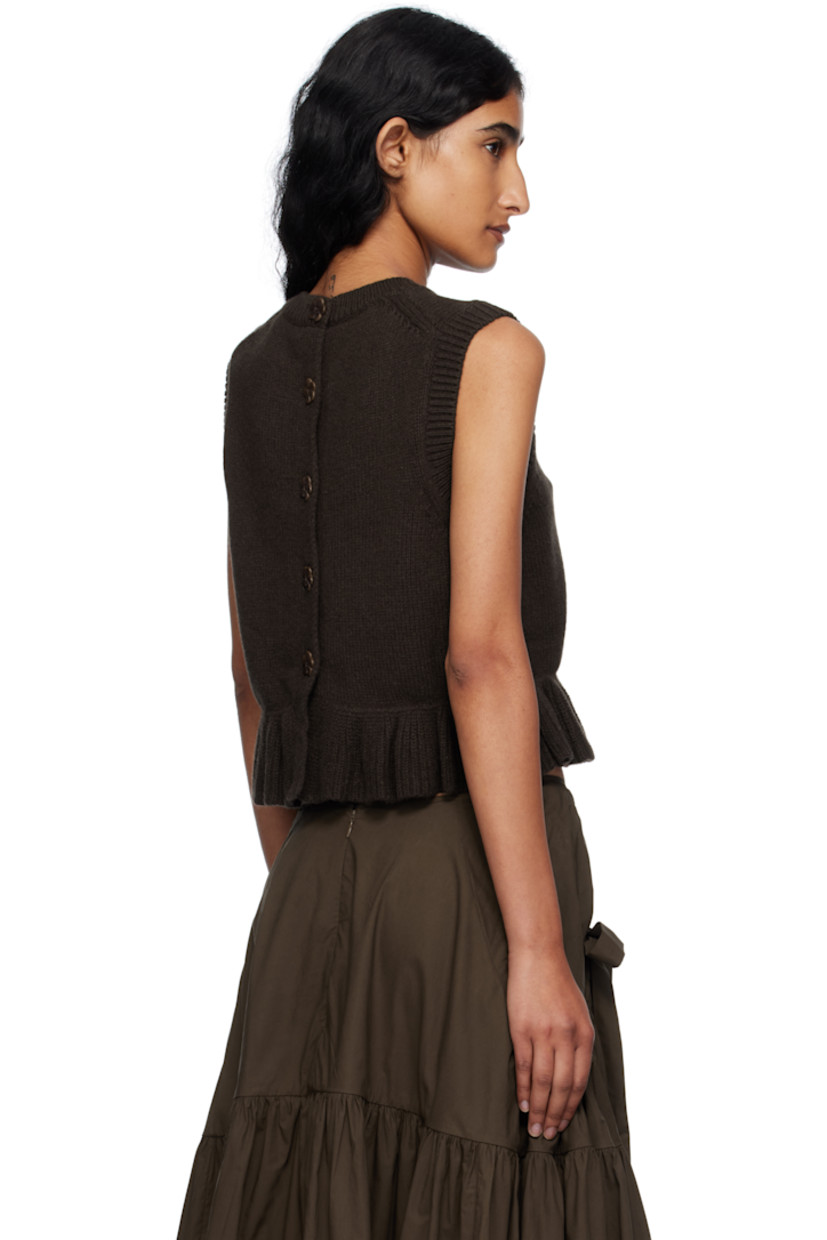 Knit recycled cashmere-blend vest.

· Rib-knit crewneck, hem, and armscyes
· Ruffled peplum hem
· Button closure at back

Supplier color: Brown