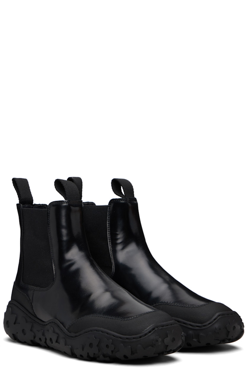 Ankle-high polished leather Chelsea boots.

· Certified Positive Luxury Butterfly Mark
· Elasticized gusset at sides 
· Pull-loops at collar 
· Textured rubber trim at welt 
· Goatskin lining 
· Treaded rubber sole

Supplier color: Black