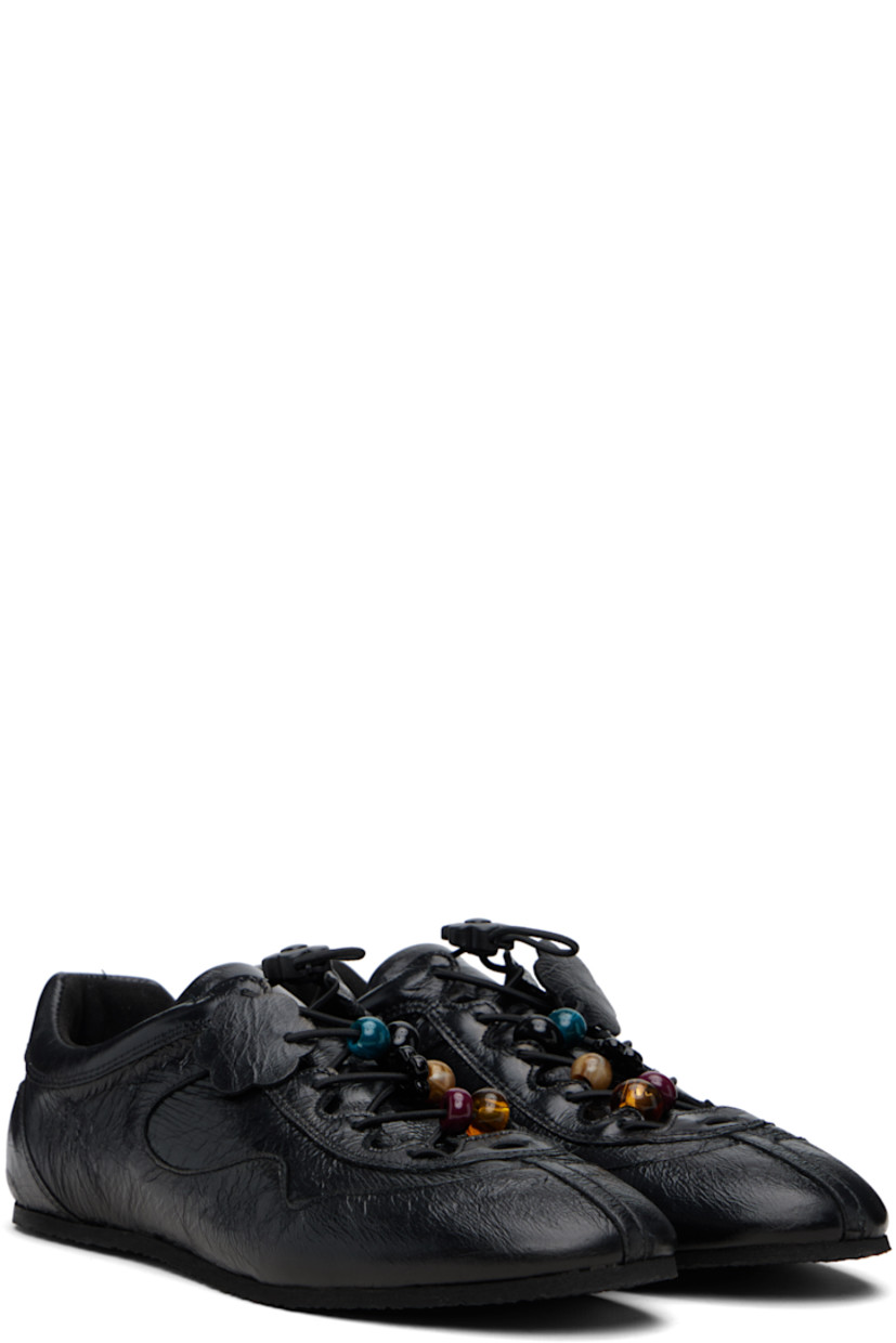 Low-top crinkled polished leather sneakers. 

· Certified Positive Luxury Butterfly Mark
· Lace-up closure with floral cord-lock hardware
· Beads and graphic appliqués at vamp
· Padded collar 
· Goatskin lining 
· Treaded crêpe rubber sole

Supplier color: Black