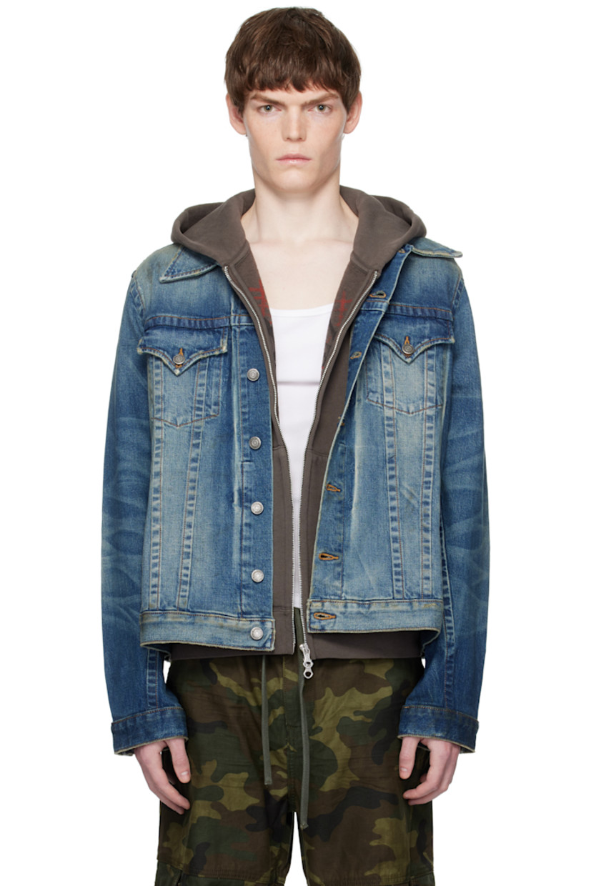 Stretch denim jacket.

· Fading, smudging, and subtle distressing throughout
· Spread collar
· Button closure
· Flap pockets at chest
· Welt pockets at waist
· Whiskering at sleeves
· Adjustable button tabs at back hem
· Logo-engraved antiqued silver-tone hardware
· Contrast stitching in tan

Supplier color: Badlands wash