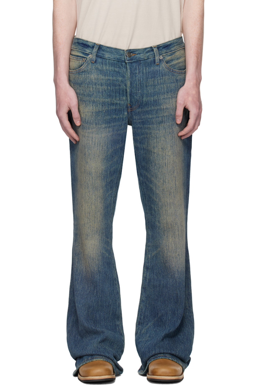 Stretch cotton twill jeans.

· Fading and whiskering throughout
· Flared leg
· Belt loops
· Five-pocket styling
· Button fly
· Embroidered logo patch at back waistband
· Logo-engraved antiqued silver-tone hardware
· Contrast stitching in tan

Supplier color: York wash