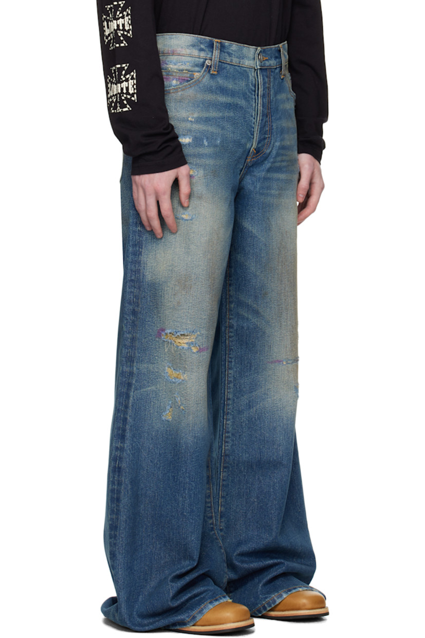 Non-stretch denim jeans. Fading, whiskering, distressing, and metallic threads throughout.

· Wide-leg
· Belt loops
· Five-pocket styling
· Button fly
· Embroidered logo patch at back waistband
· Logo-engraved antiqued silver-tone hardware
· Contrast stitching in tan

Supplier color: Cassidy