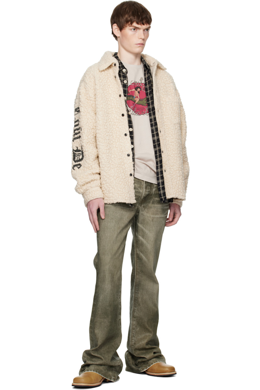 Virgin wool-blend fleece overshirt.

· Spread collar
· Button closure
· Patch pocket at chest
· Shirttail hem
· Dropped shoulders
· Mismatched logo with crystal-cut accents at sleeves
· Buttoned barrel cuffs

Supplier color: Ivory