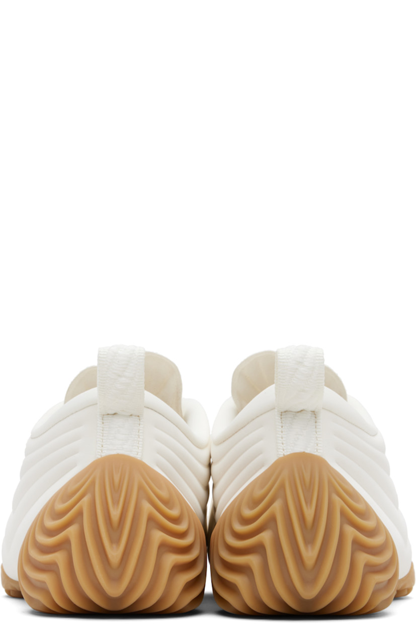 Low-top velvet sneakers.

· Swoosh bonded at vamp and tongue
· Offset lace-up closure
· Padded tongue and collar
· Pull-loop at heel collar
· Jersey lining
· Treaded rubber sole

Please note that this item may be shipped only within North America.

Supplier color: Sail/Metallic silver