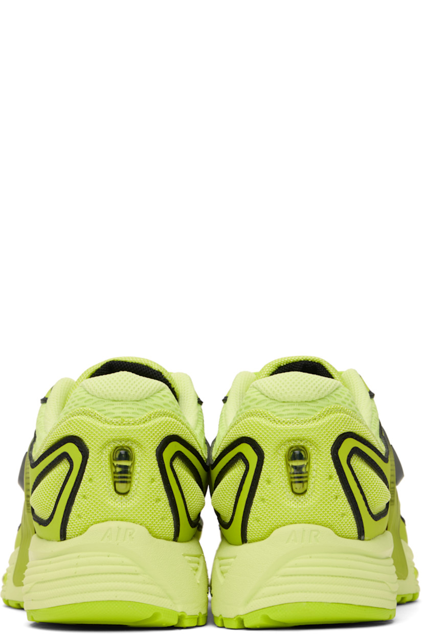 Low-top mesh and buffed leather sneakers in yellow.

· Swoosh embossed at vamp and sides
· Lace-up closure
· Text printed at padded tongue
· Padded collar
· Rubberized overlay at sides
· Mesh lining
· Air Sole unit at foam rubber midsole
· Treaded rubber sole

Please note that this item may be shipped only within North America.

Supplier color: Light lemon twist/Cyber/Black