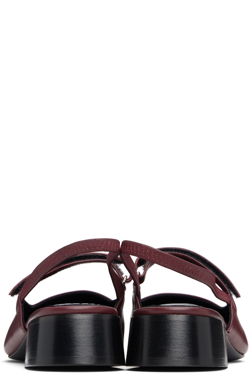 Buffed leather ballerina flats.

· Square toe 
· Velcro strap at vamp
· Elasticized slingback strap
· Stacked leather block heel with rubber injection
· Leather sole 

Supplier color: Deep red