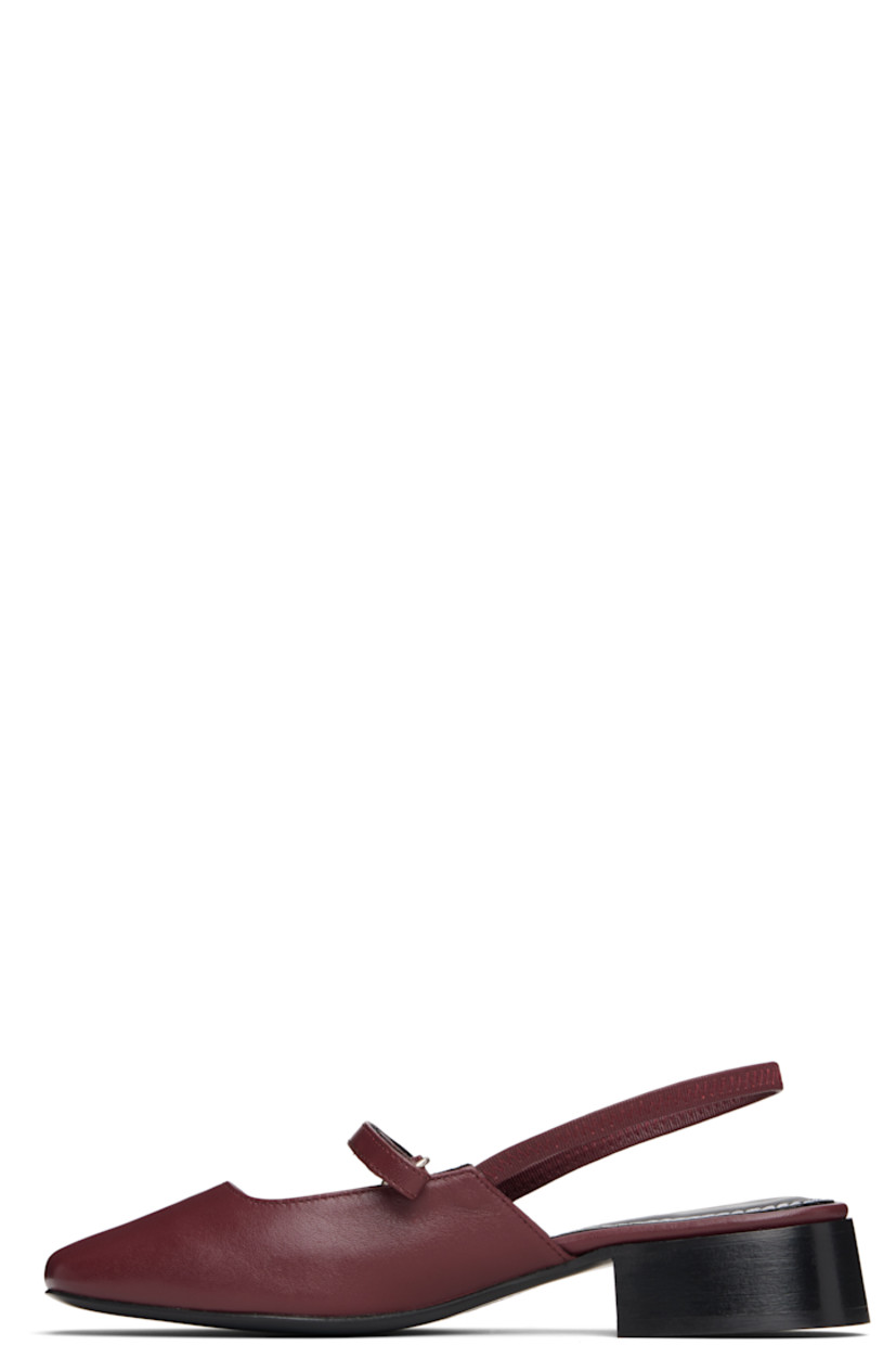Buffed leather ballerina flats.

· Square toe 
· Velcro strap at vamp
· Elasticized slingback strap
· Stacked leather block heel with rubber injection
· Leather sole 

Supplier color: Deep red