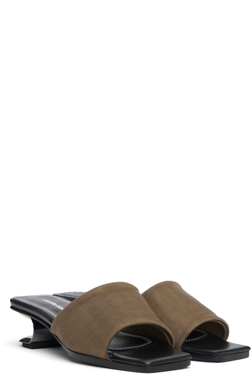 Handcrafted mesh heeled sandals.

· Open square toe 
· Sculptural kitten heel
· Leather sole with rubber injections
· Heel: H2"

Supplier color: Nude