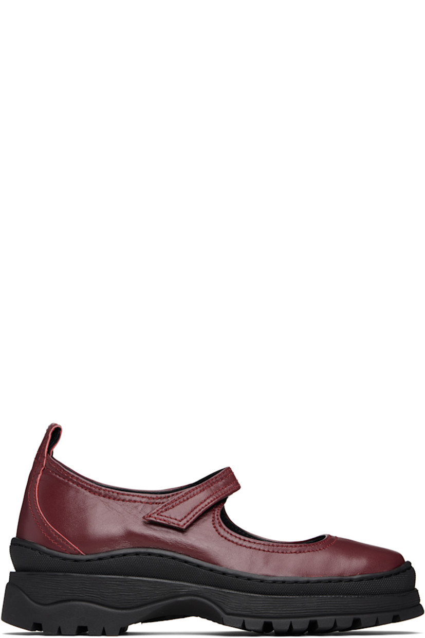 Low-top grained leather Mary Jane-style sneakers.

· Velcro strap at vamp
· Pull-loop at collar
· Treaded rubber sole 

Supplier color: Deep red