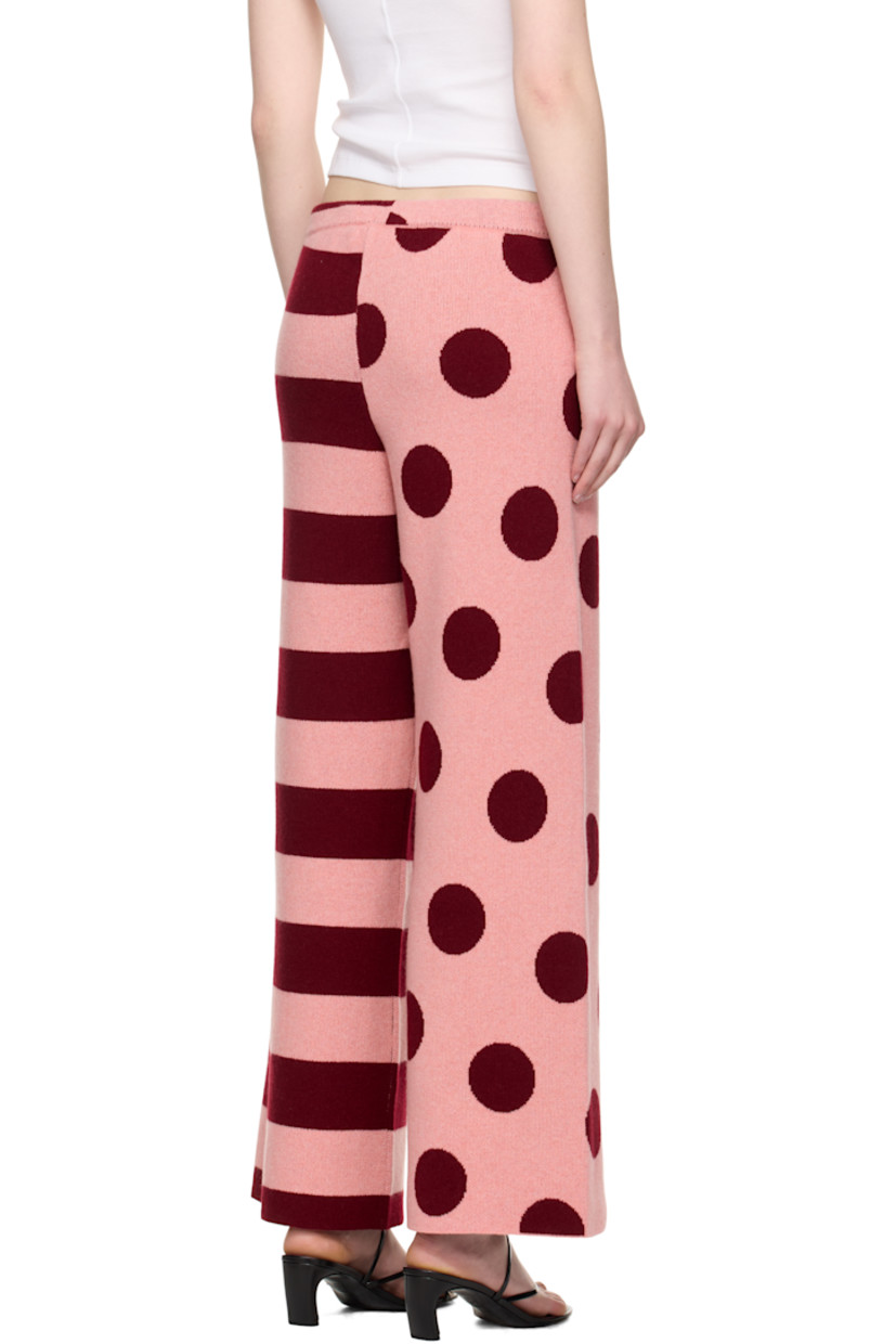 Hand-knit cashmere lounge pants. Jacquard stripes and polka-dot pattern throughout.

· Wide-leg 
· Drawstring at elasticized waistband

Supplier color: Red cedar/Bubblegum