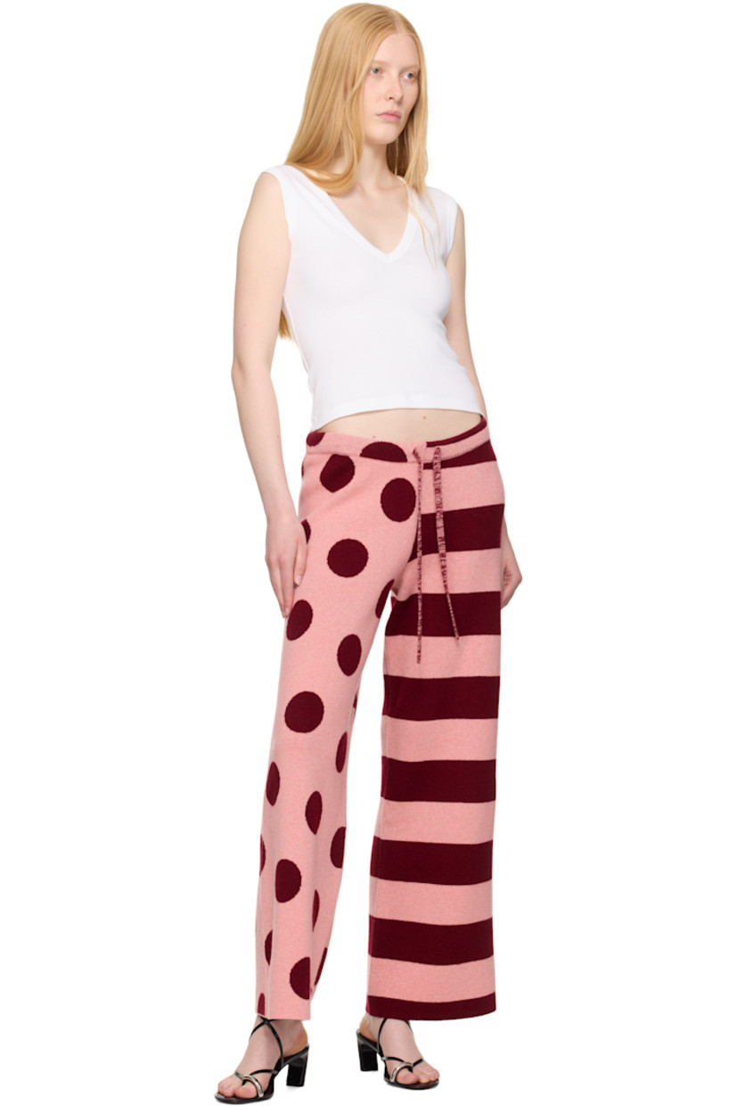 Hand-knit cashmere lounge pants. Jacquard stripes and polka-dot pattern throughout.

· Wide-leg 
· Drawstring at elasticized waistband

Supplier color: Red cedar/Bubblegum