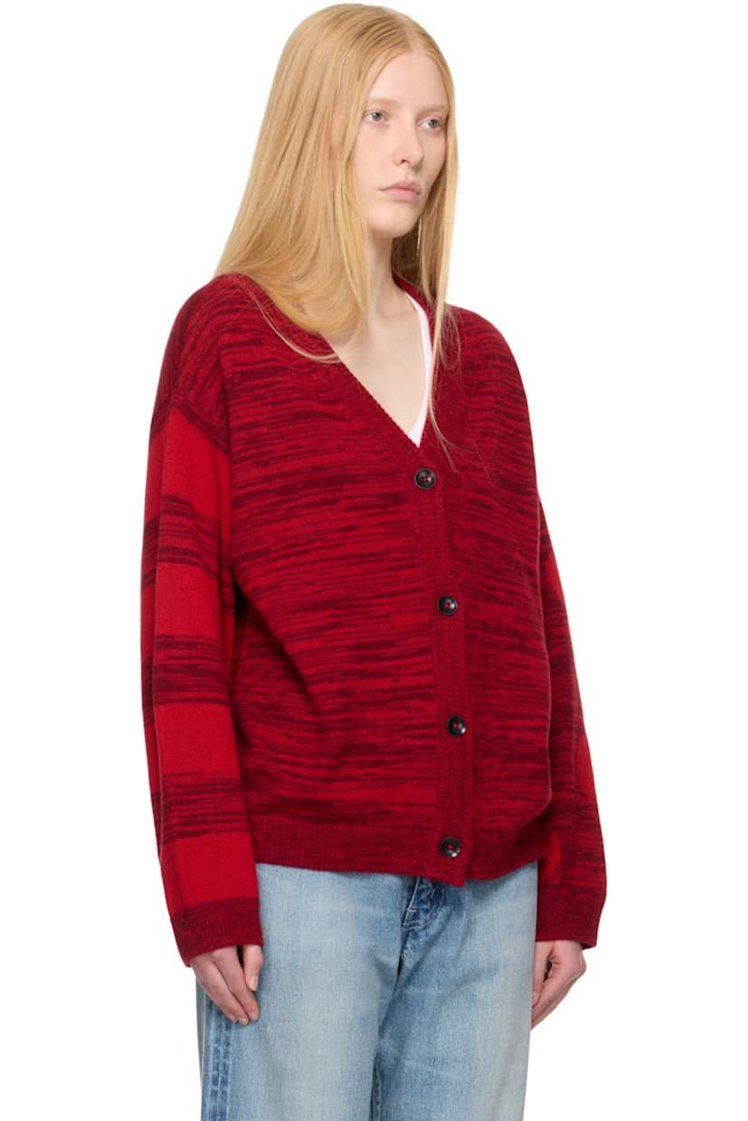 Hand-knit cashmere cardigan. Intarsia stripes and polka-dot pattern throughout. 

· Rib-knit Y-neck, hem, and cuffs
· Button closure
· Dropped shoulders
· Intarsia graphic and text at back

Supplier color: Red cedar/Bubblegum