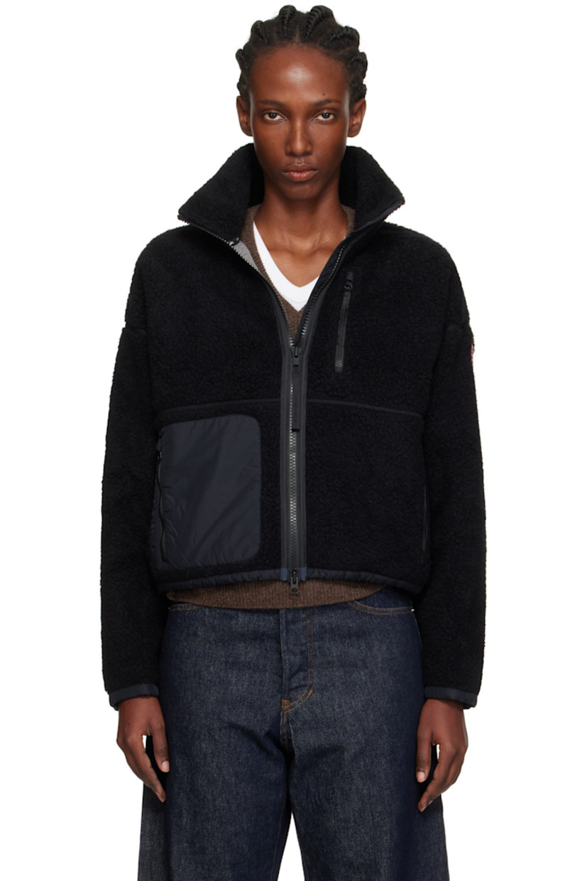 Wool-blend fleece jacket.

· Stand collar
· Two-way zip closure
· Zip pockets at front
· Taffeta trim at hem and cuffs
· Concealed bungee-style drawstring at hem
· Dropped shoulders
· Embroidered logo patch at sleeve
· Full jersey lining

Supplier color: Black