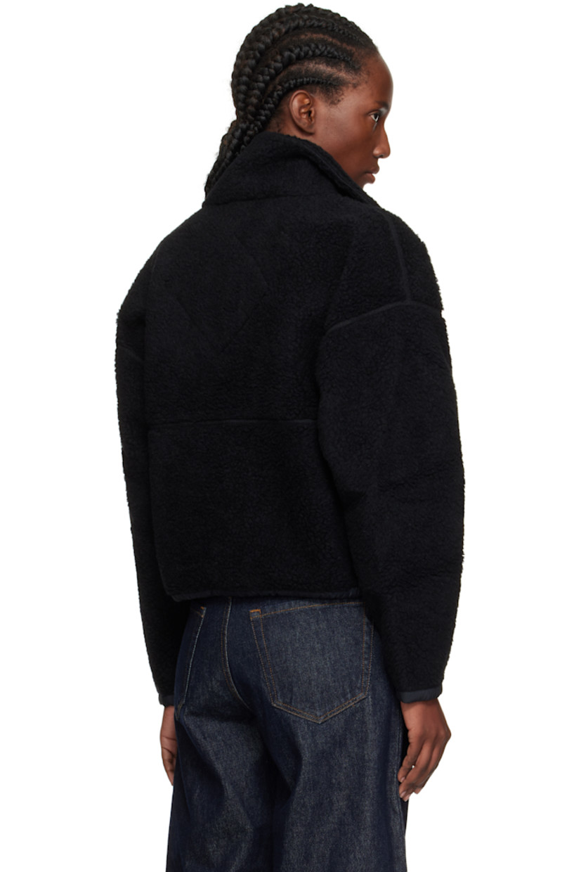 Wool-blend fleece jacket.

· Stand collar
· Two-way zip closure
· Zip pockets at front
· Taffeta trim at hem and cuffs
· Concealed bungee-style drawstring at hem
· Dropped shoulders
· Embroidered logo patch at sleeve
· Full jersey lining

Supplier color: Black