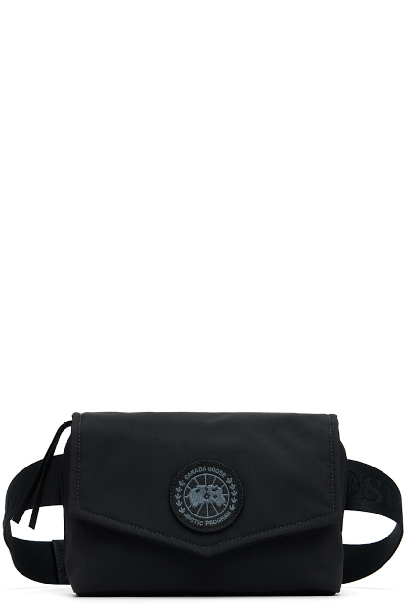 Padded Cordura® nylon taffeta belt bag.

· Water-repellent 
· Adjustable and detachable crossbody strap
· Embroidered logo patch at face
· Press-stud flap
· Zip closure
· Patch pocket at interior
· Quilted nylon satin lining
· Logo-engraved hardware
· H5.5" x W8" x D2"

Supplier color: Black