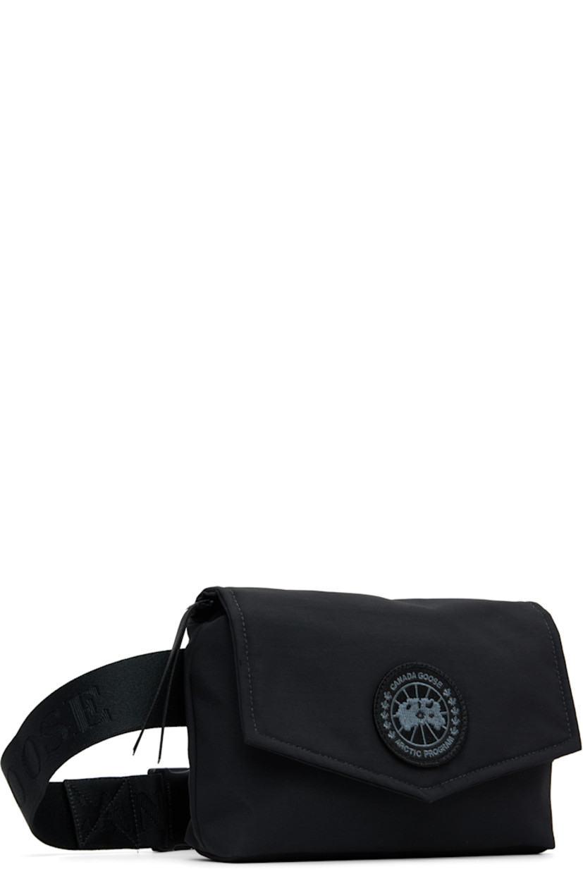 Padded Cordura® nylon taffeta belt bag.

· Water-repellent 
· Adjustable and detachable crossbody strap
· Embroidered logo patch at face
· Press-stud flap
· Zip closure
· Patch pocket at interior
· Quilted nylon satin lining
· Logo-engraved hardware
· H5.5" x W8" x D2"

Supplier color: Black